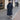 Long transitional coat with a high collar and adjustable waist