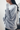 Ladies’ oversized knitted blouse with boat neck