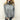Women’s knit sweater with a high collar and buttons