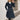 Ladies’ double-breasted coat with belt and fitted silhouette