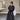 Women’s long trench coat with tie belt and classic collar
