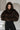 Women's poncho in faux fur with a hood and oversized fit