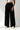 Women's high-waisted trousers with wide legs and pleats